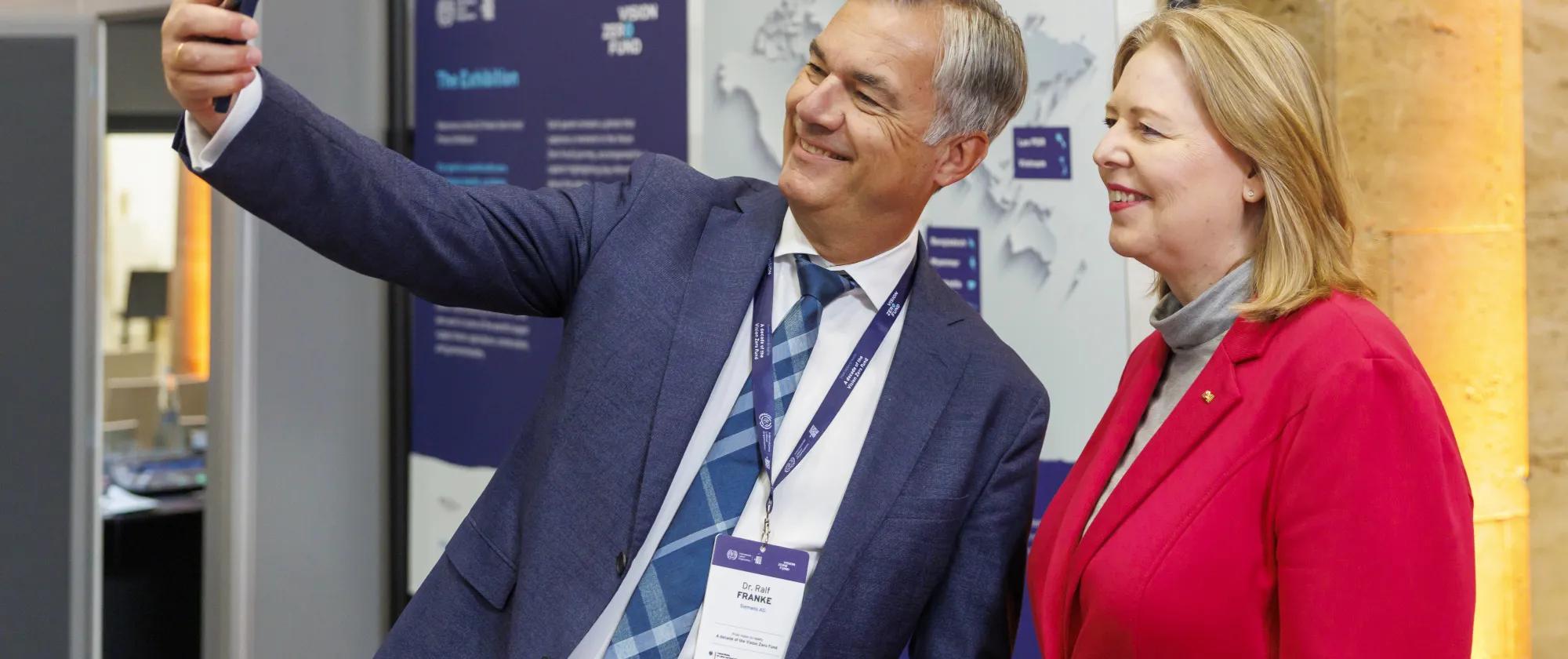 Participants take a selfie at the event. 