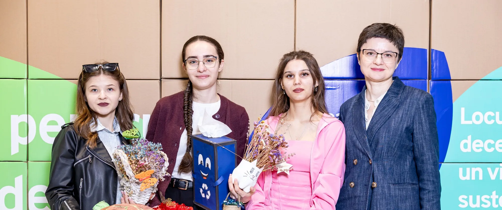 Four students at a gala event 