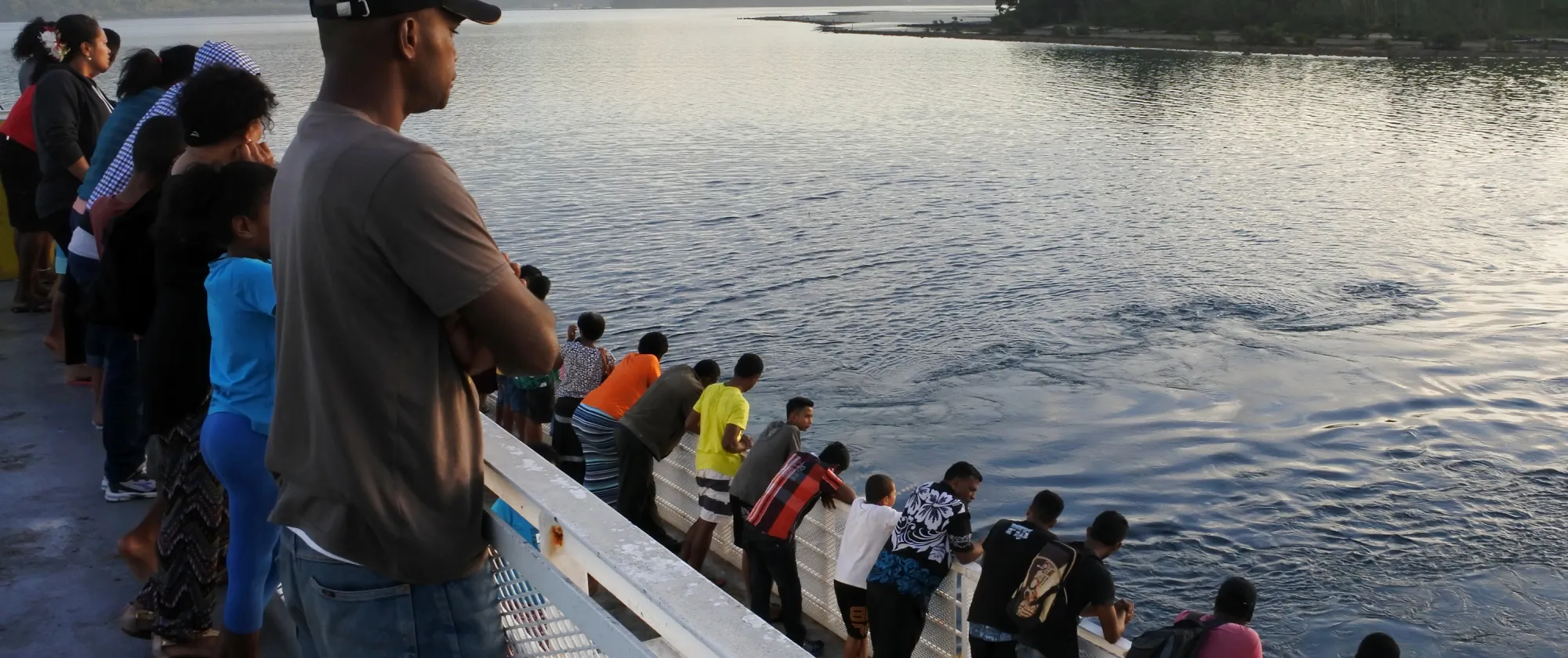 Passengers on a ship in the Pacific islands
