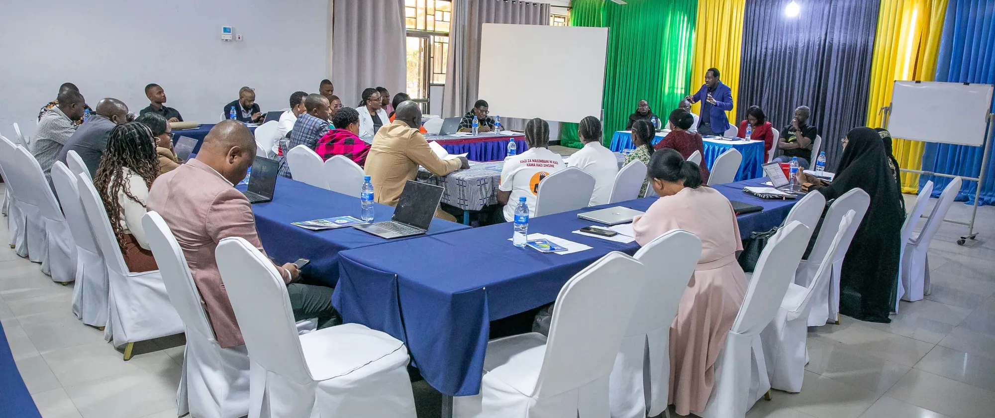 Participants seated in a workshop session