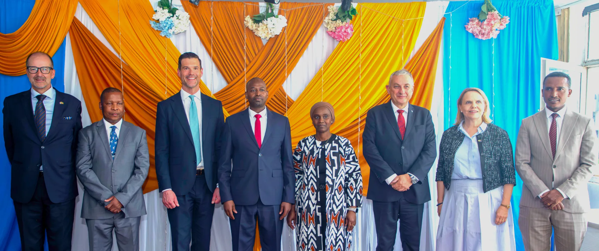 Eight officials stand together inside Ethiopia’s Bole Woreda 12 Job Centre during a high-level EU and Swedish visit focused on employment and labour migration reforms.