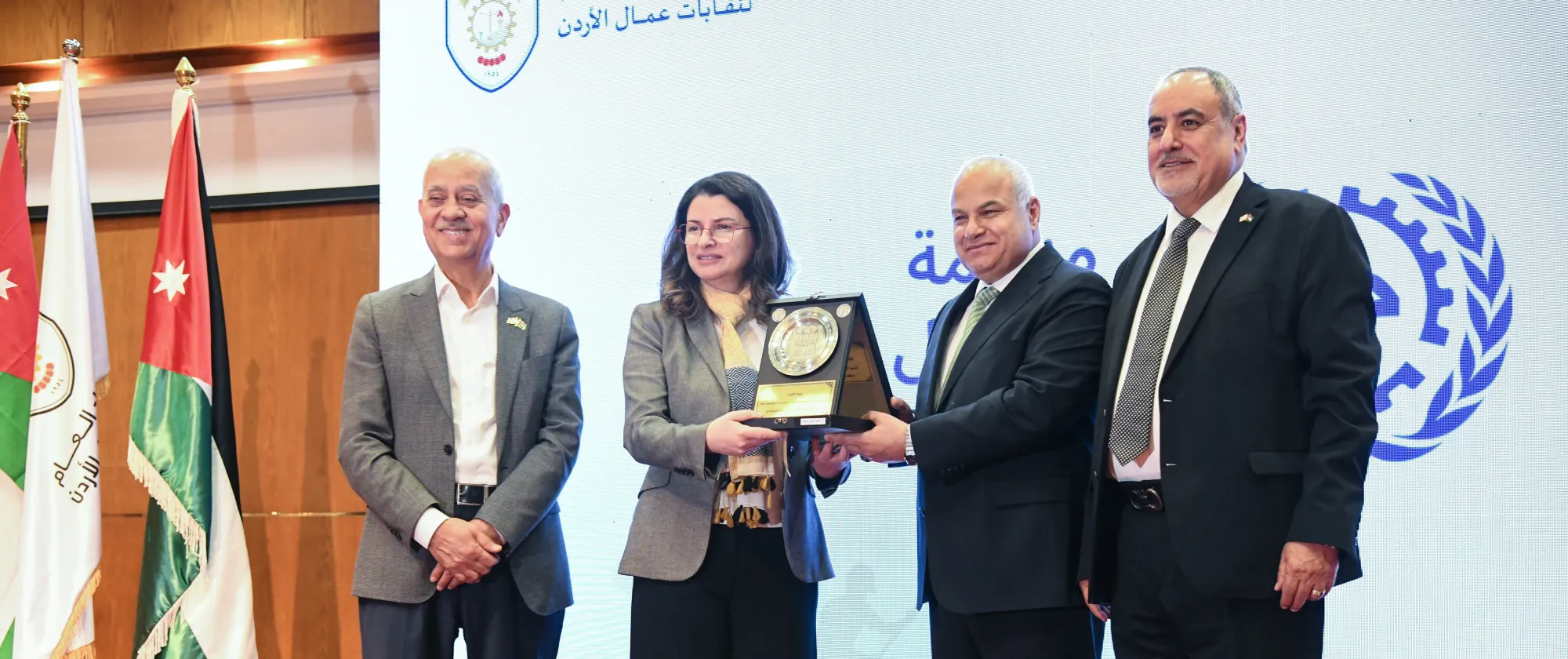 ILO Regional Director for the Arab States Ruba Jaradat receives a commemorative plaque alongside Minister of Labour Khaled Al-Bakkar, GFJTU President Khaled Al-Fanatsah & JCI Chairman Fathi Al-Jaghbeir during International Workers’ Day event in Jordan.