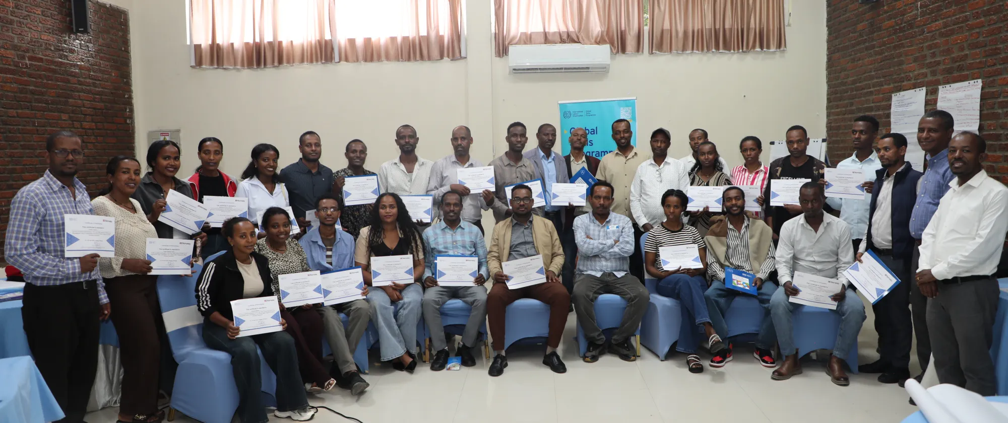 Trainees with their certifications