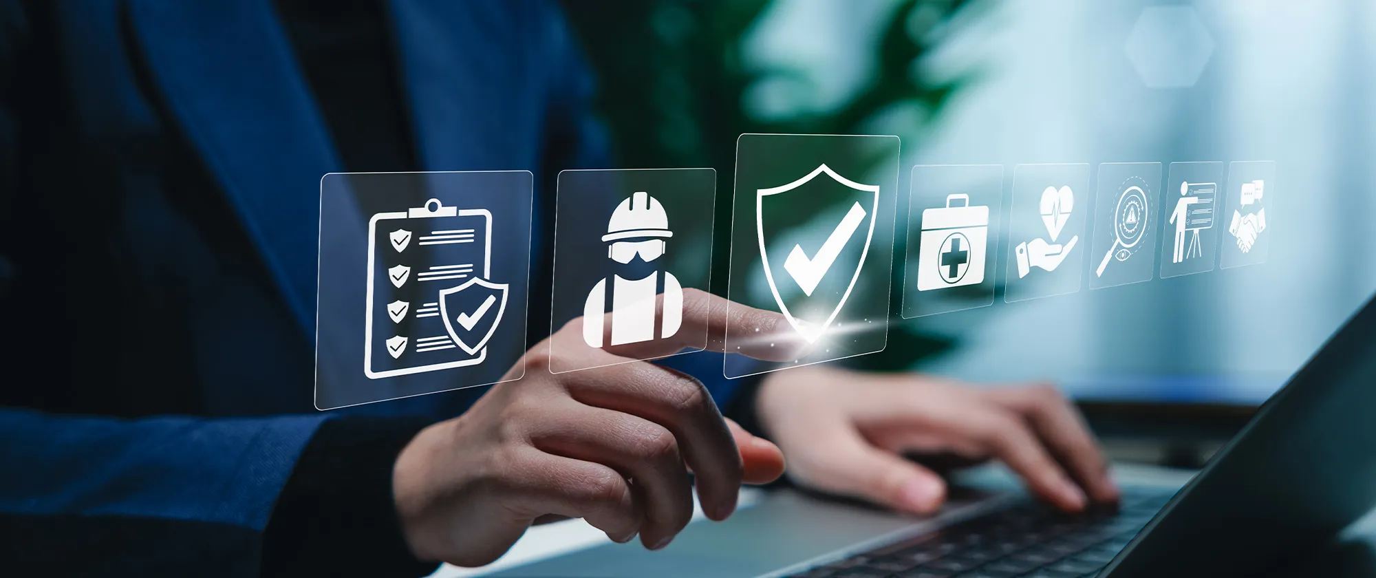 A person using a laptop with digital icons representing work safety, compliance, regulations, and professional standards, symbolizing secure workplace practices.
