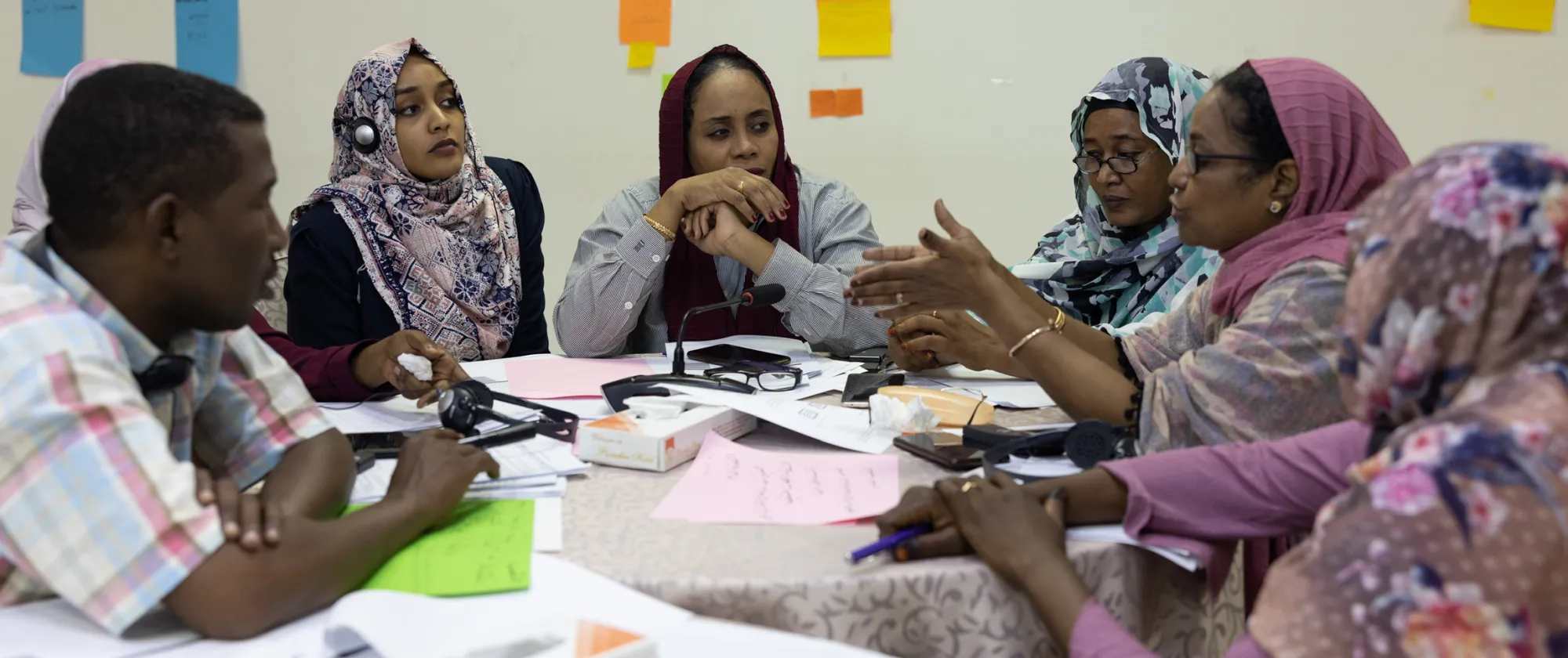 women and men at workshop in sudan