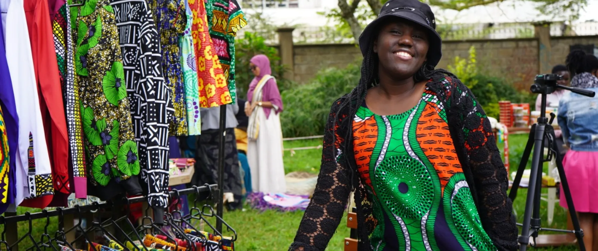 women refugee at her stall at world refugee day celebrations