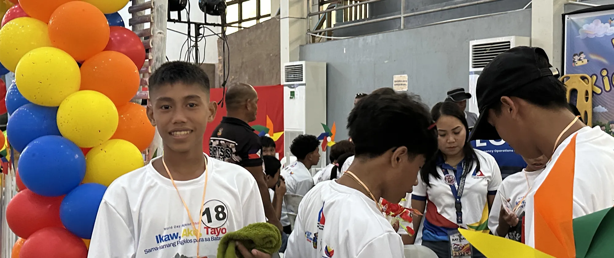 Danilo attends an information and service caravan during the local World Day Against Child Labour in his hometown.