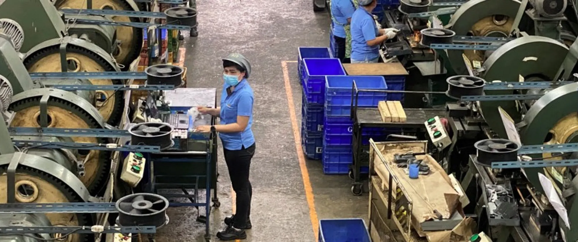 A worker in a Thai company producing components for the automotive industry 