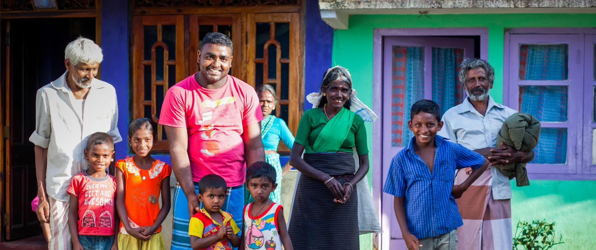 A large family standing outside together.