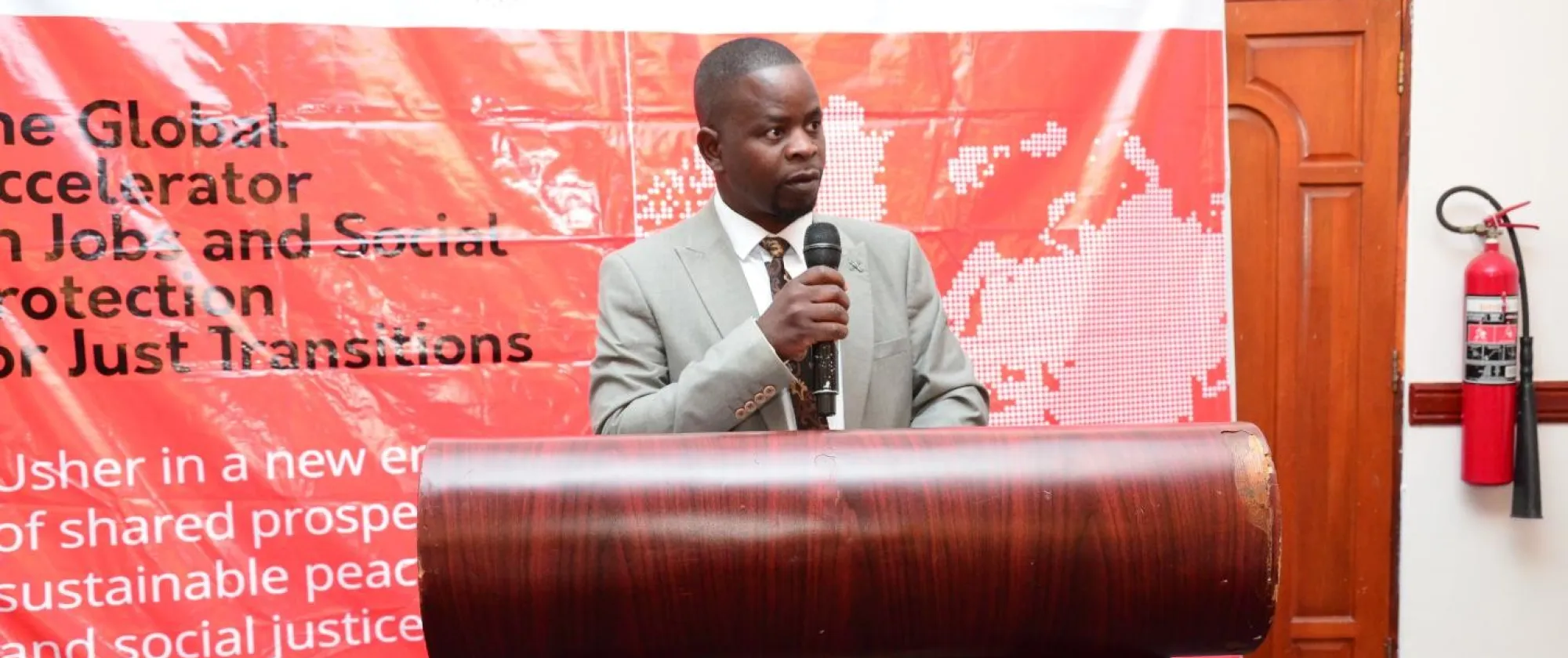 Mr. Sangwani Hara, Board Chairperson of the Tea Association of Malawi (TAML) speaks at the meeting.