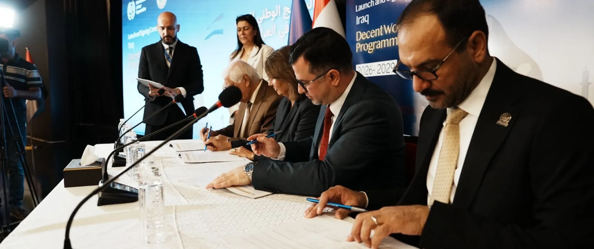 Representatives of the Government of Iraq, the Conference of Trade Union Federations and Unions in Iraq, the Iraqi Federation of Industries and the ILO sign Iraq’s new Decent Work Country Programme.