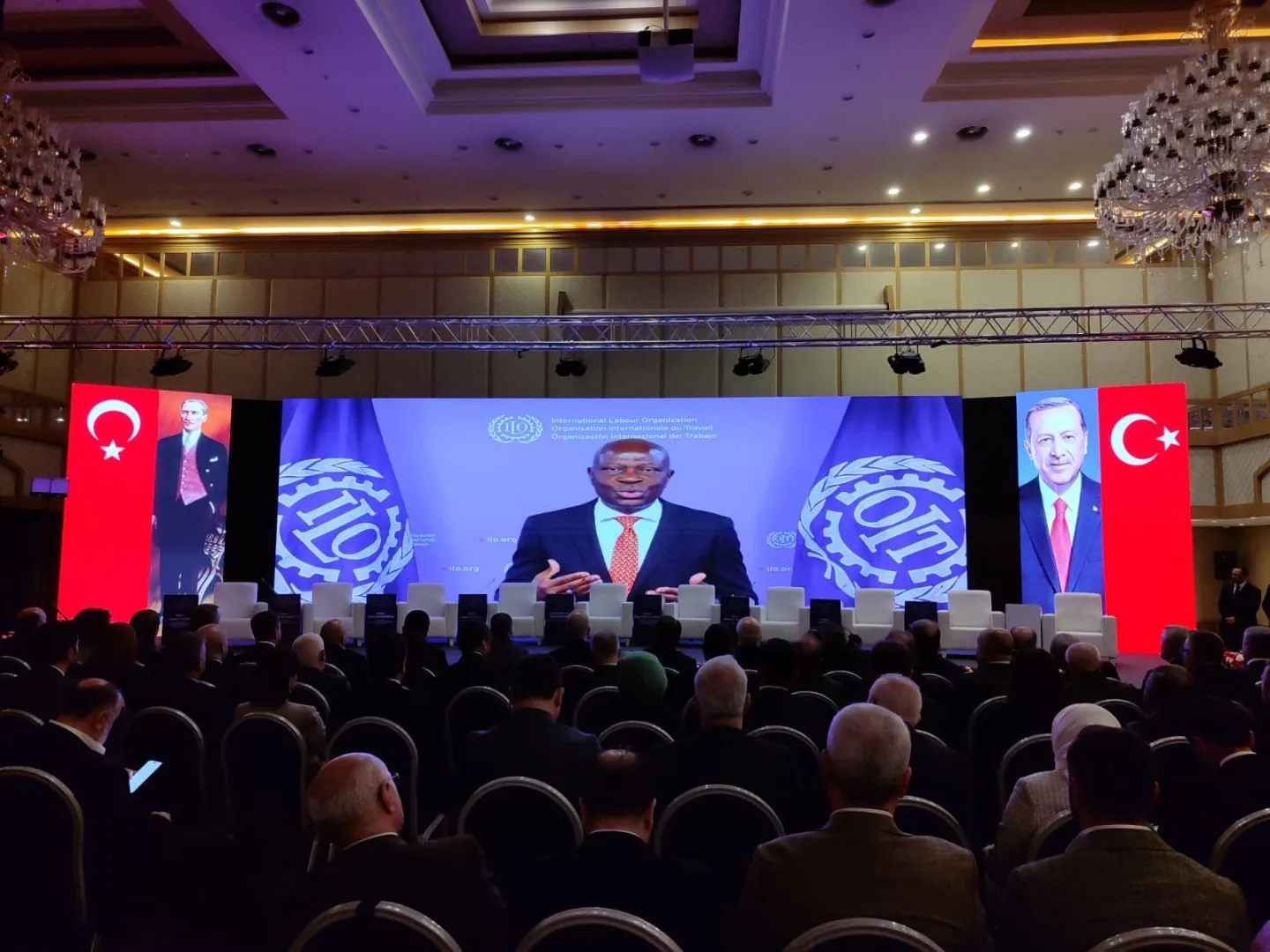 ILO Director-General Houngbo addressing the 13th Labour Assembly in Turkiye via video message