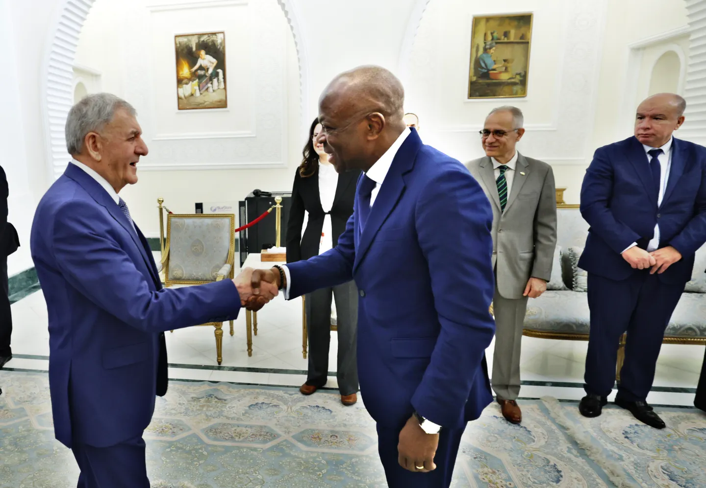two men shaking hands.