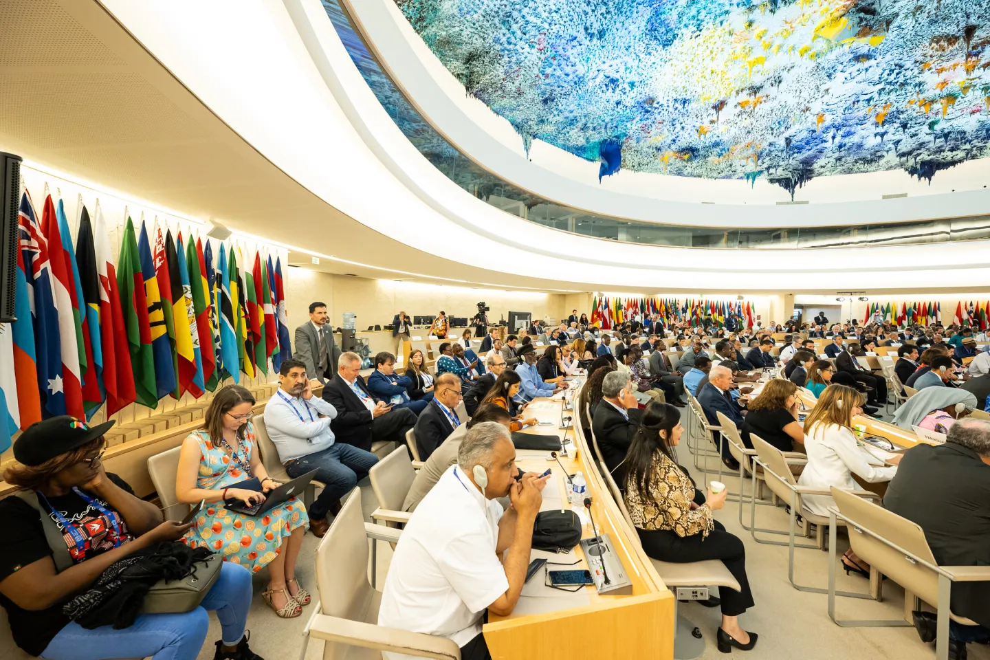 Delegates working on the ILC 111th session