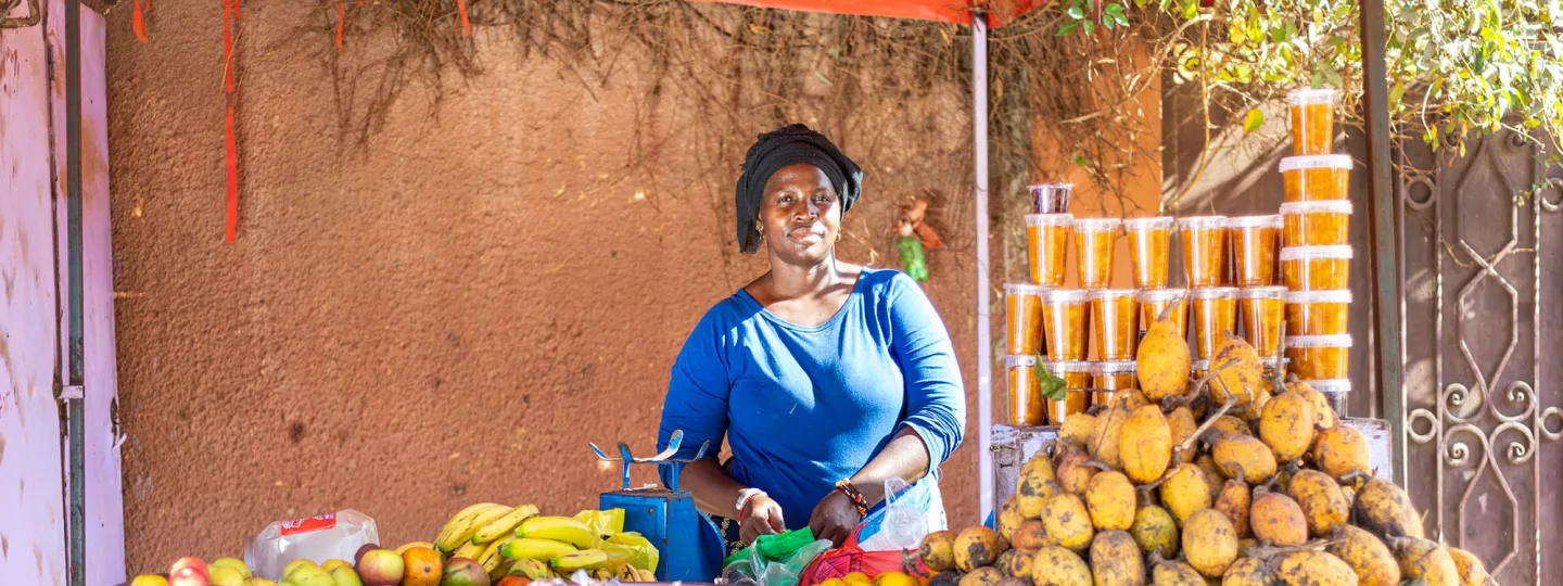 A street vendor selling fruit in Dakar