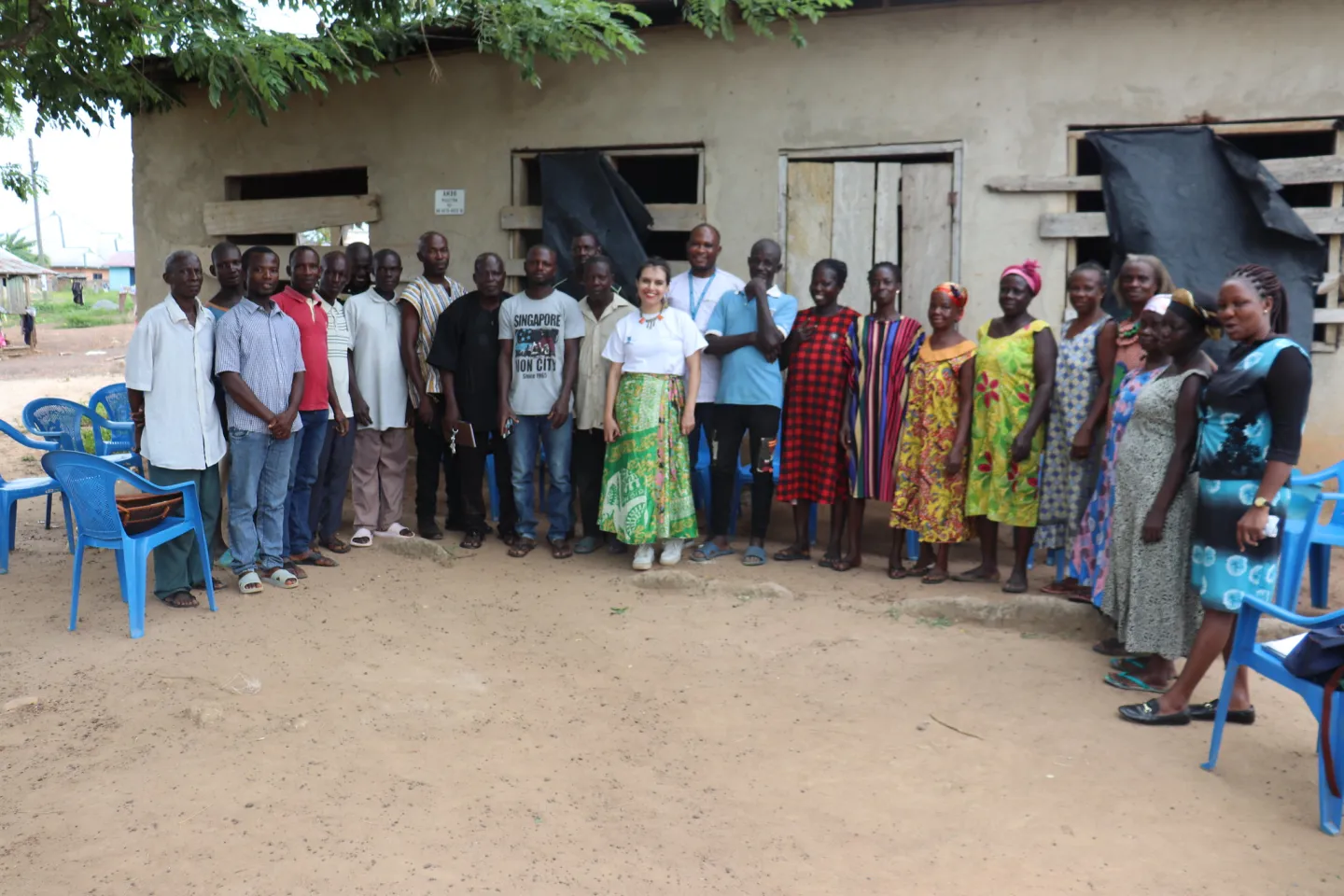 Community members and ILO officials pose for a picture