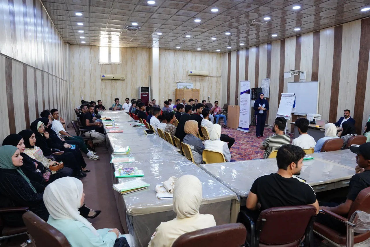 a group of students attending a training in a class
