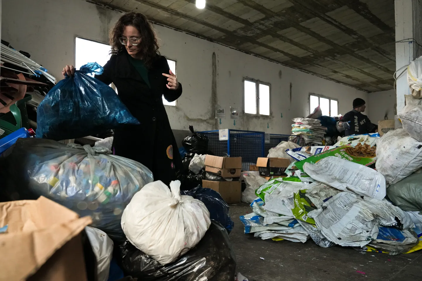 women entrepreneur at garbage sorting unit