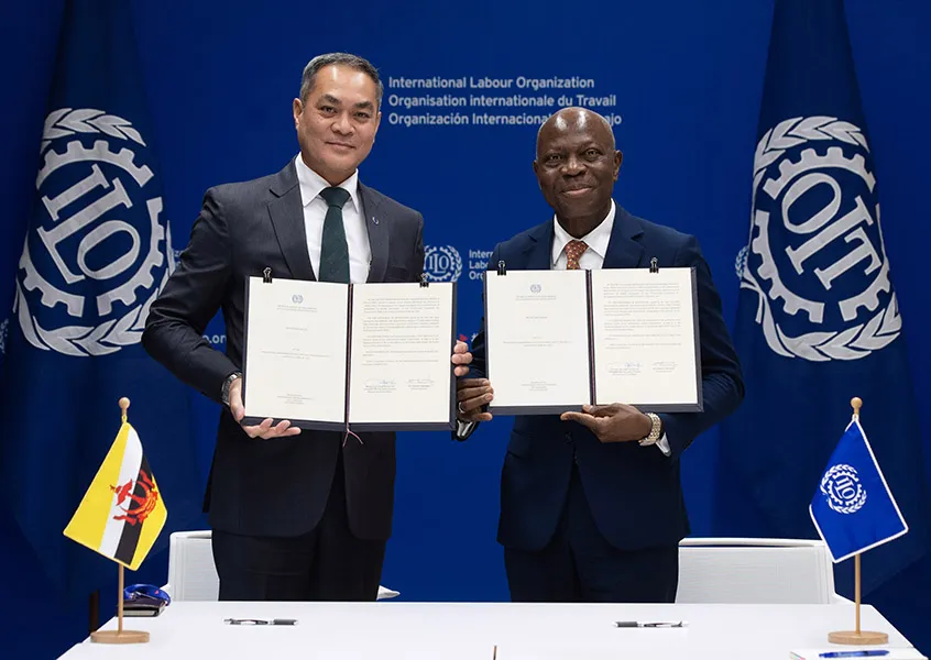 Ratification ceremony of Convention No. 187 on 11 June 2024: Mr Dato Awang Haji Ahmaddin Haji Abd Rahman, Minister of Home Affairs of Brunei Darussalam, and Gilbert F. Houngbo, Director-General of the ILO.