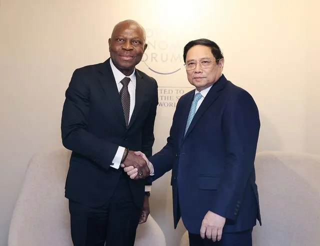 Tổng Giám đốc ILO Gilbert F. Houngbo và Thủ tướng Chính phủ Việt Nam Phạm Minh Chính