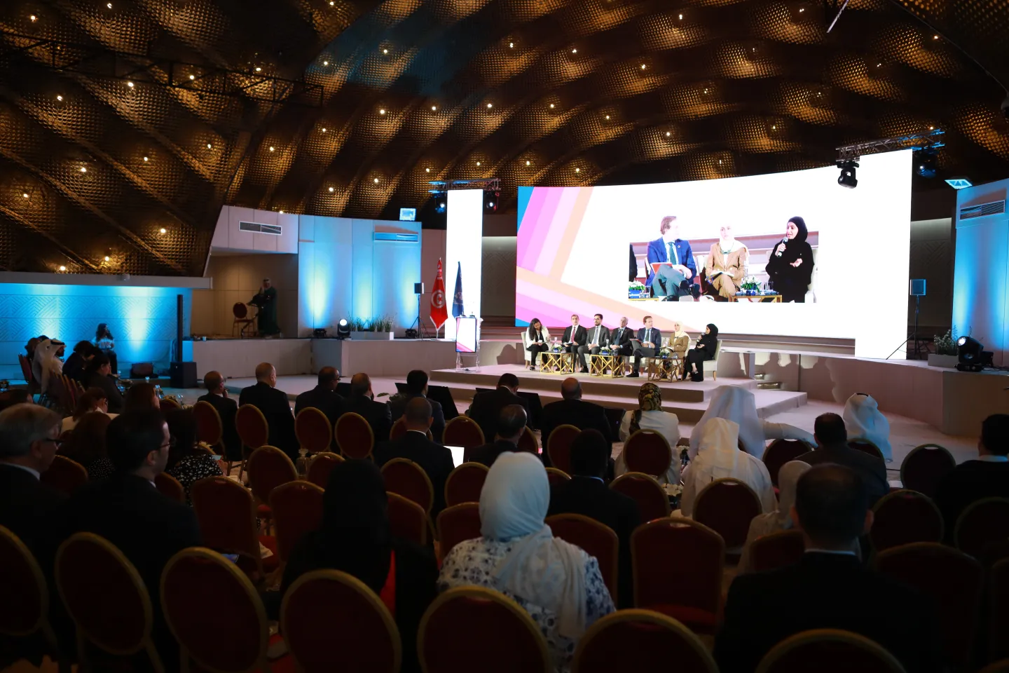 View of a conference room with speakers at podium, in Tunis, Tunisia