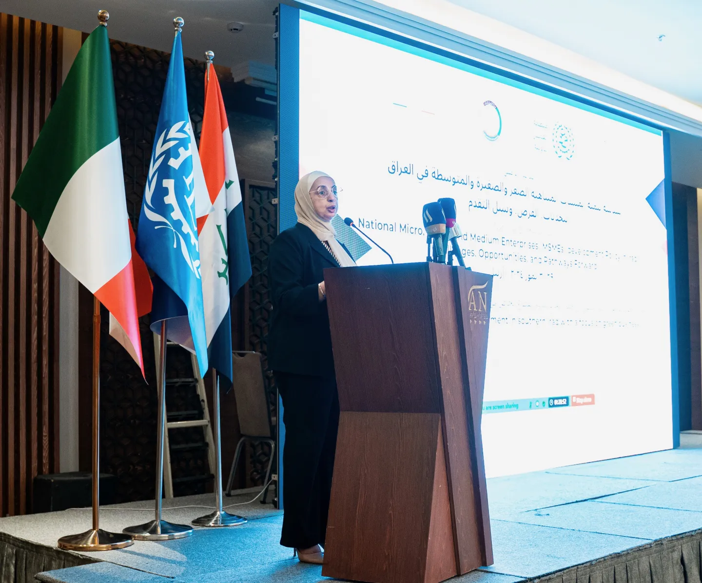 Dr. Maha Kattaa, ILO country coordinator, giving the opening remarks. 
