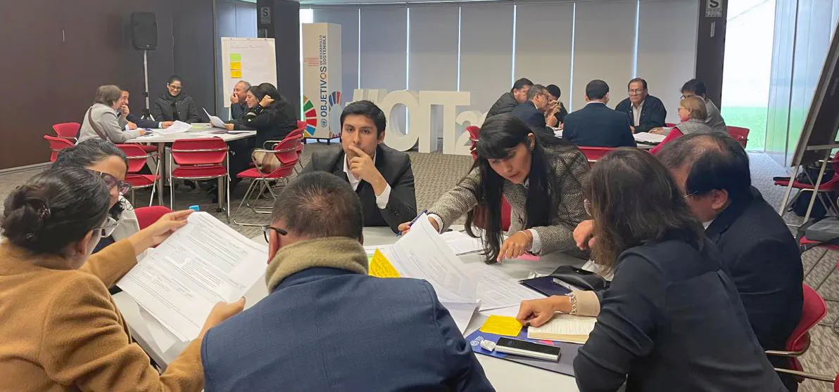 People working in groups at a workshop