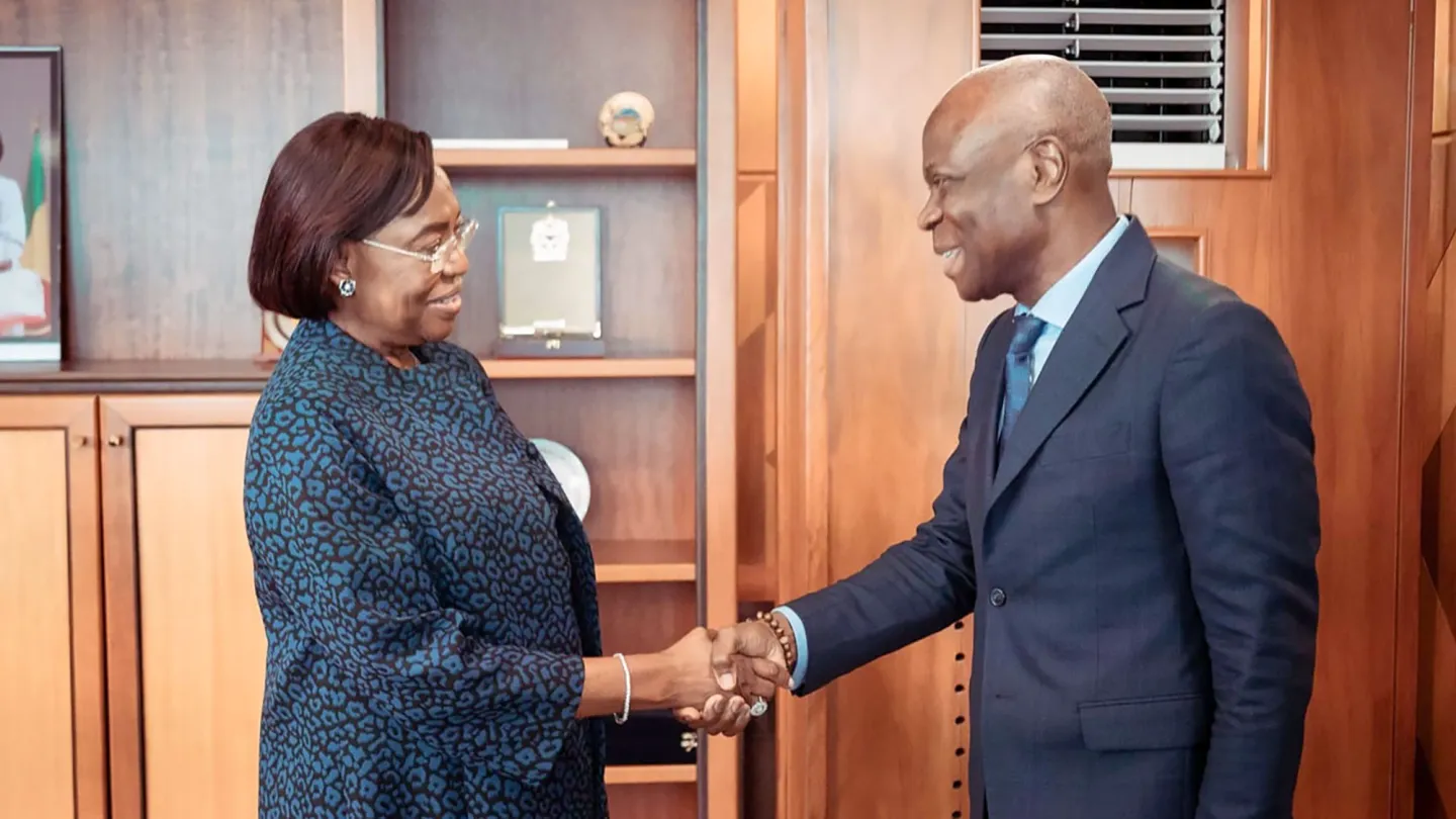 Gilbert F. Houngbo shakes hands with the President of the Senate, Paulette Missambo, on July 1, 2024 in Libreville.