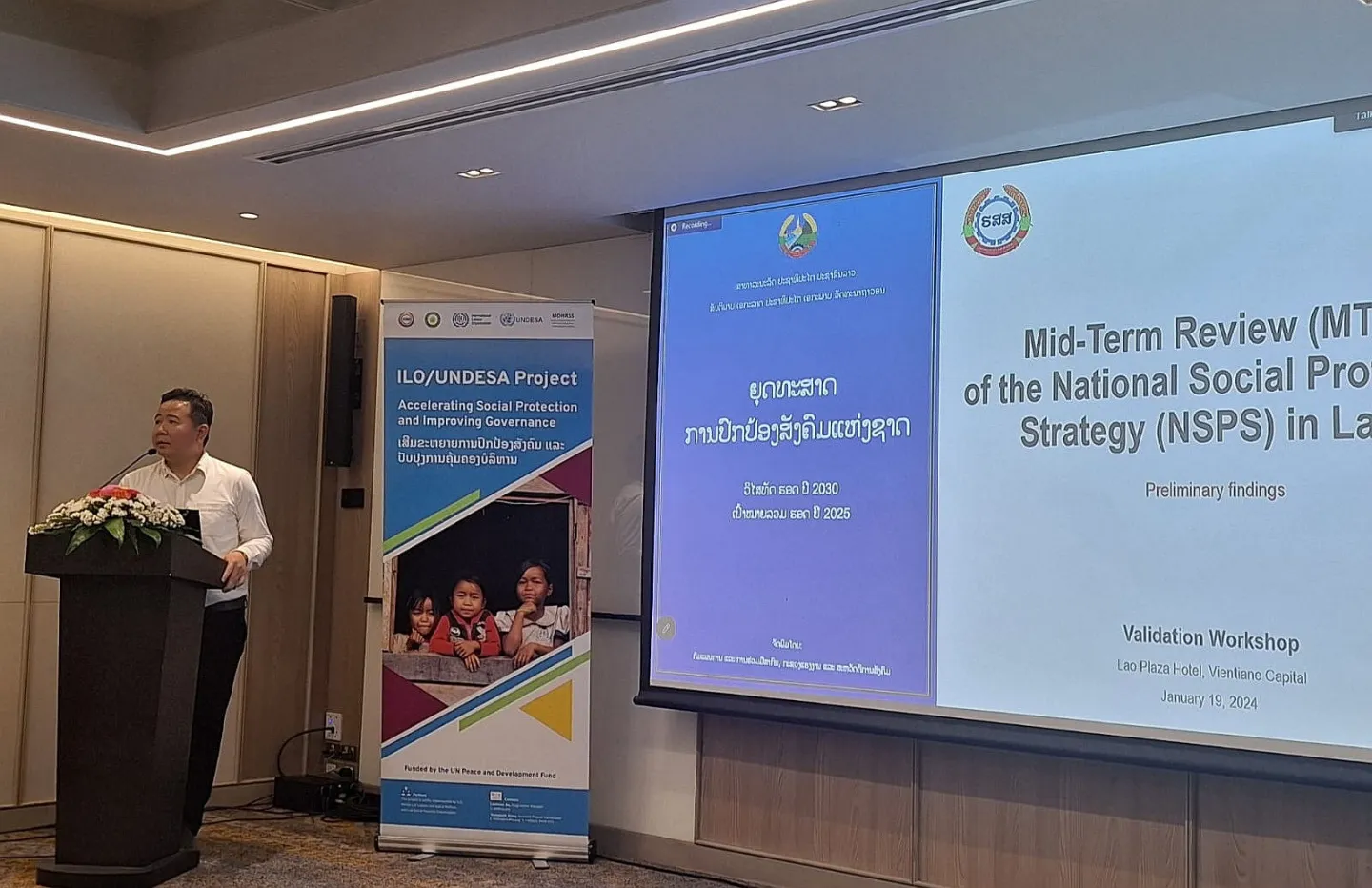 Chanhsy Samavong, ILO Consultant presents the mid-term review findings at the validation meeting on 19 January 2024