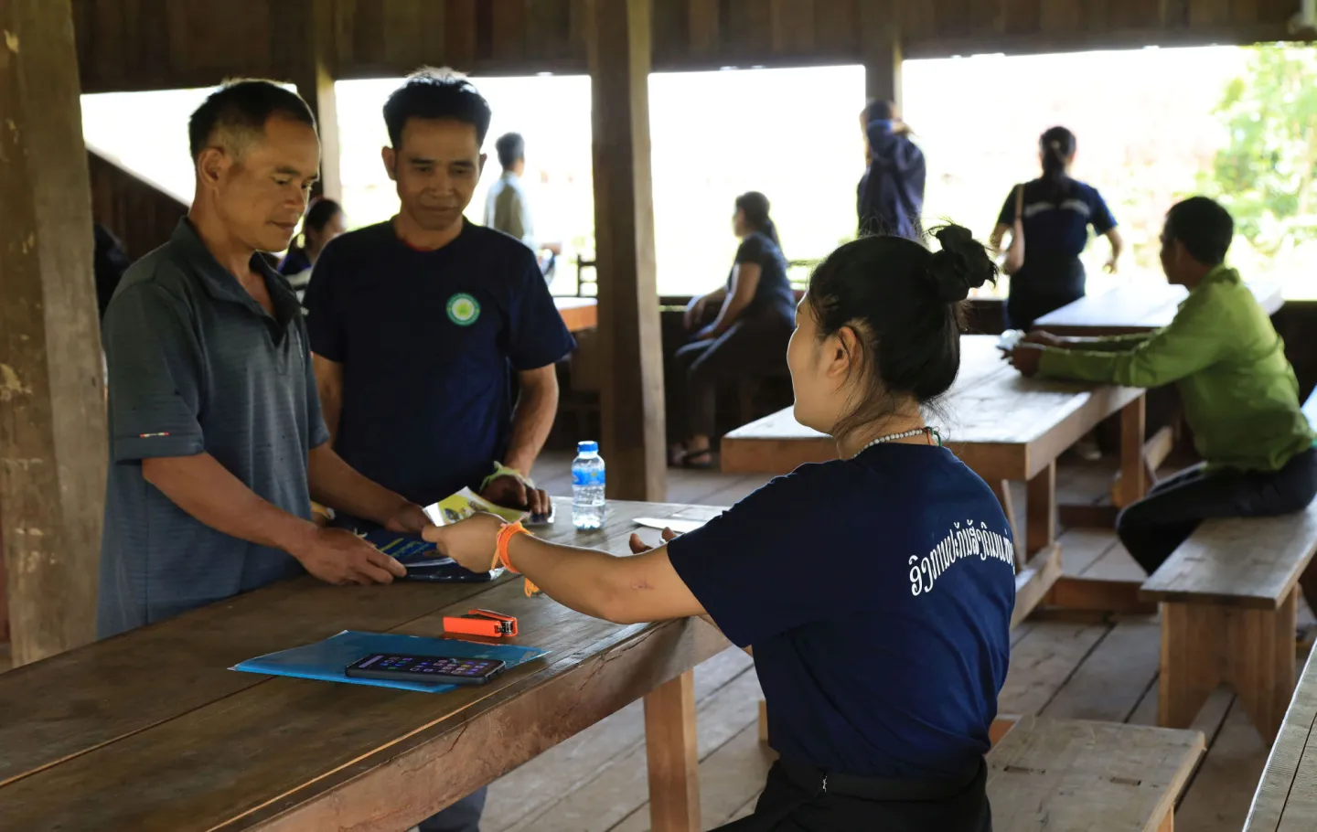 A mobile registration service for farmers in Huay Dam Mai Village, Lao People's Democratic Republic