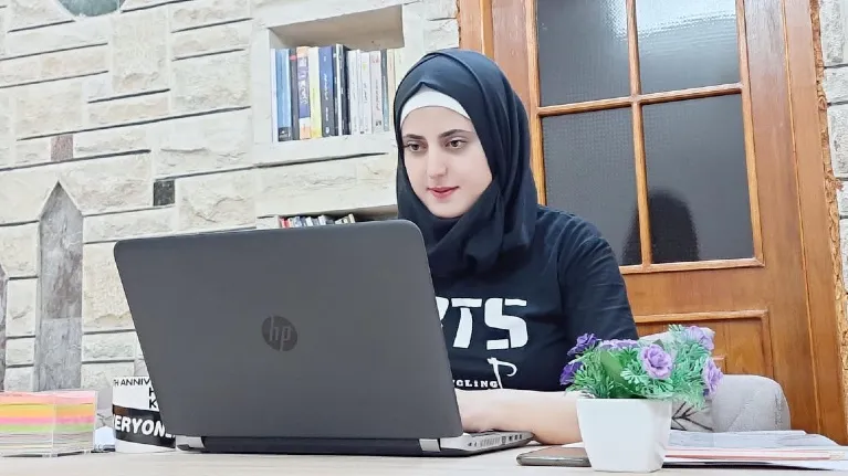woman working on a laptop