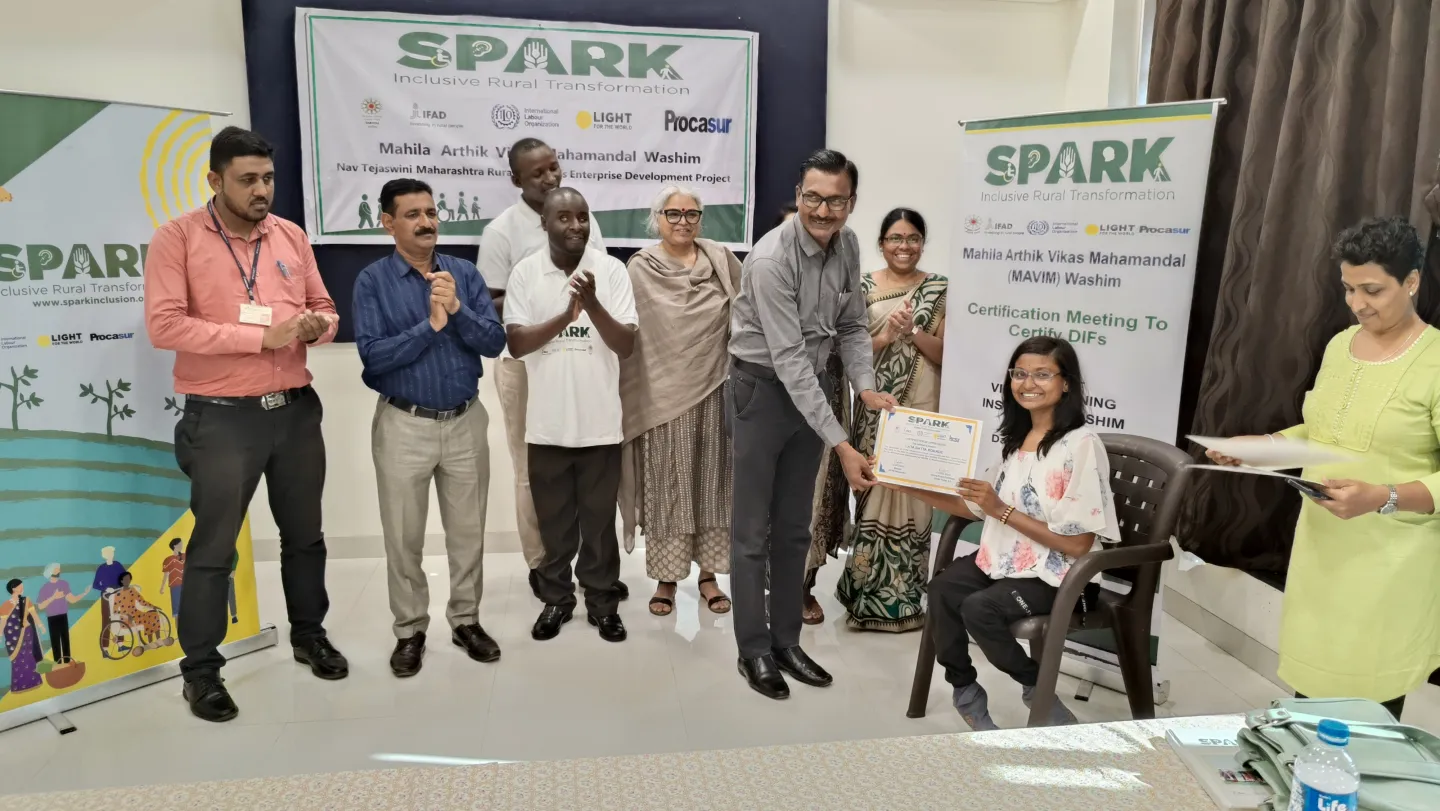 Persons being handed certificates at the end of making presentations