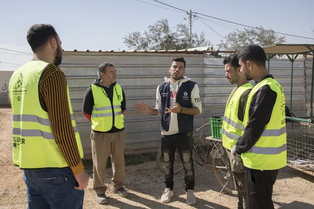men discussing about jobs