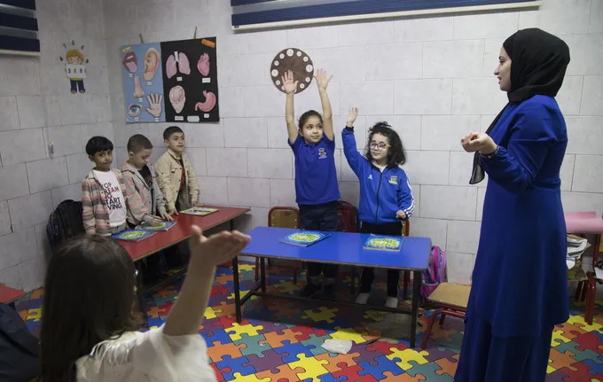 woman teacher in a classroom