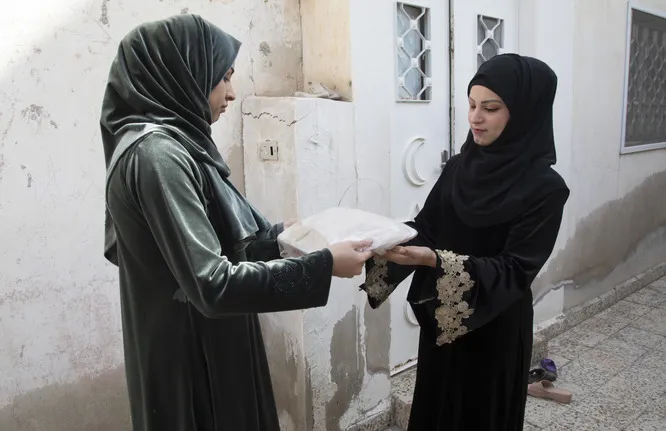 woman delivering her business products