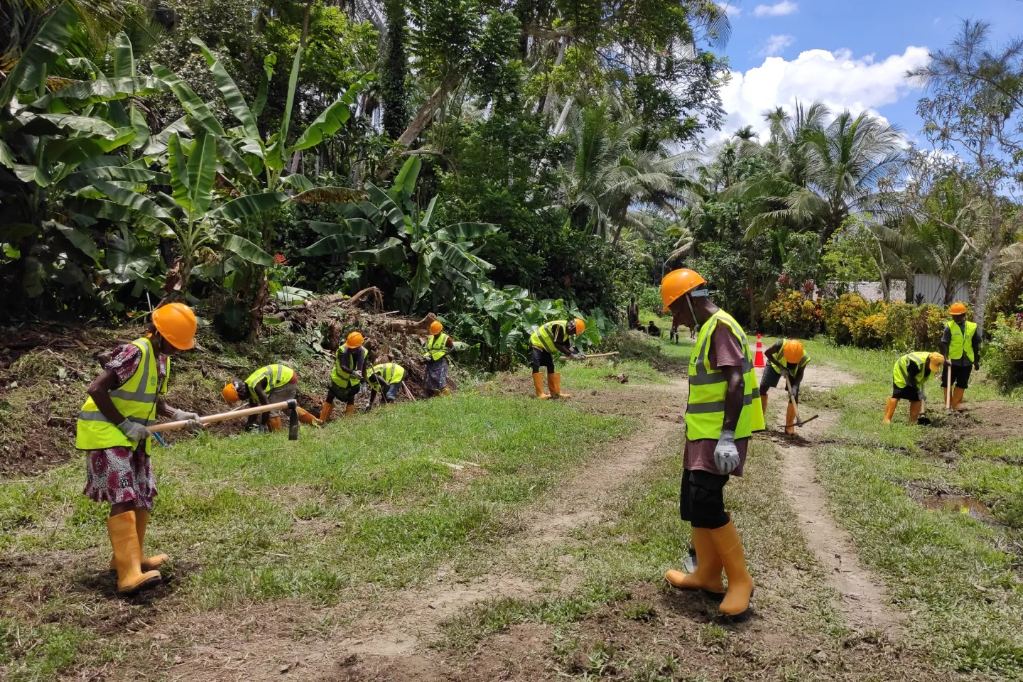 workers on a road rehabilitation project