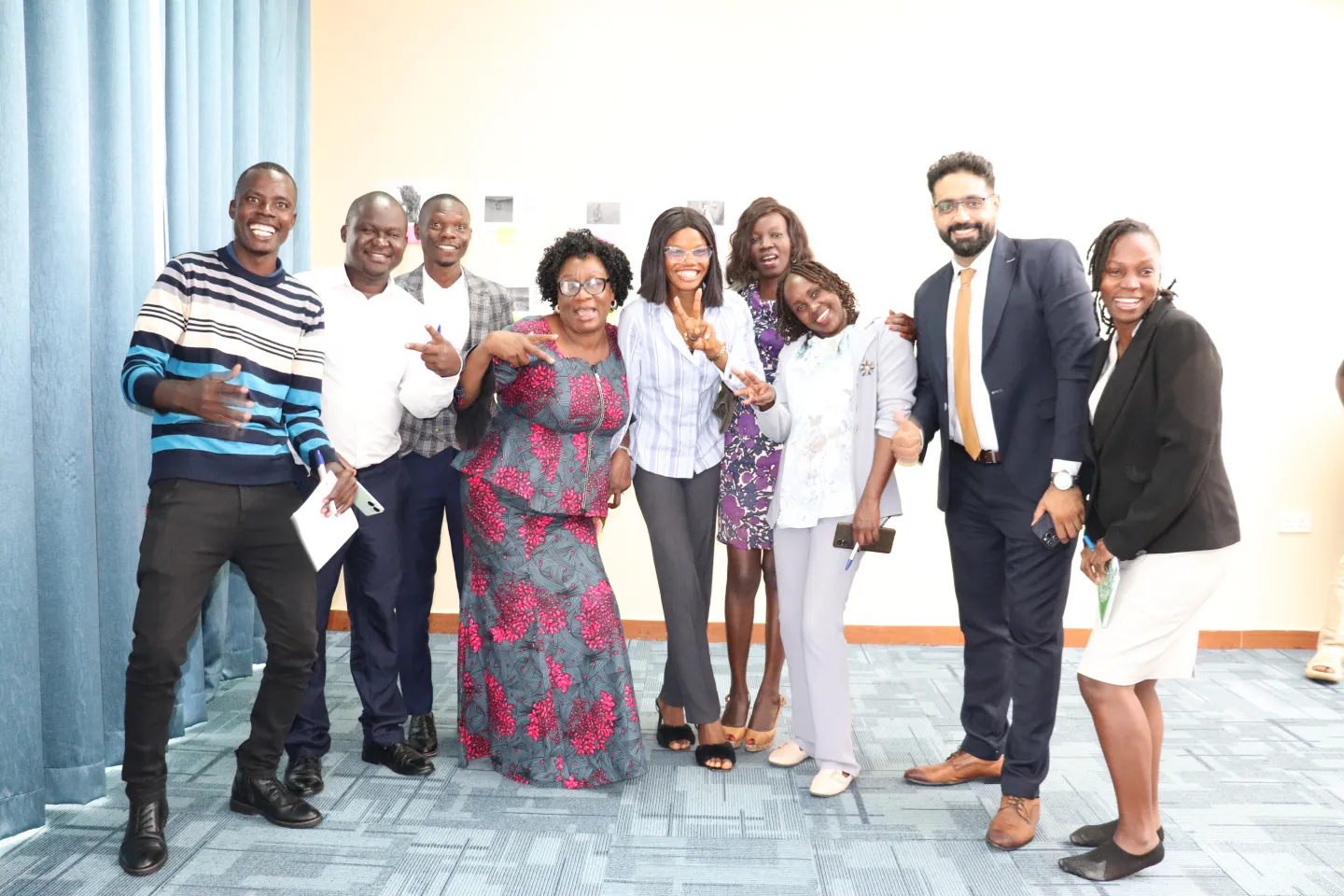 Participants to a training pose for a group photo