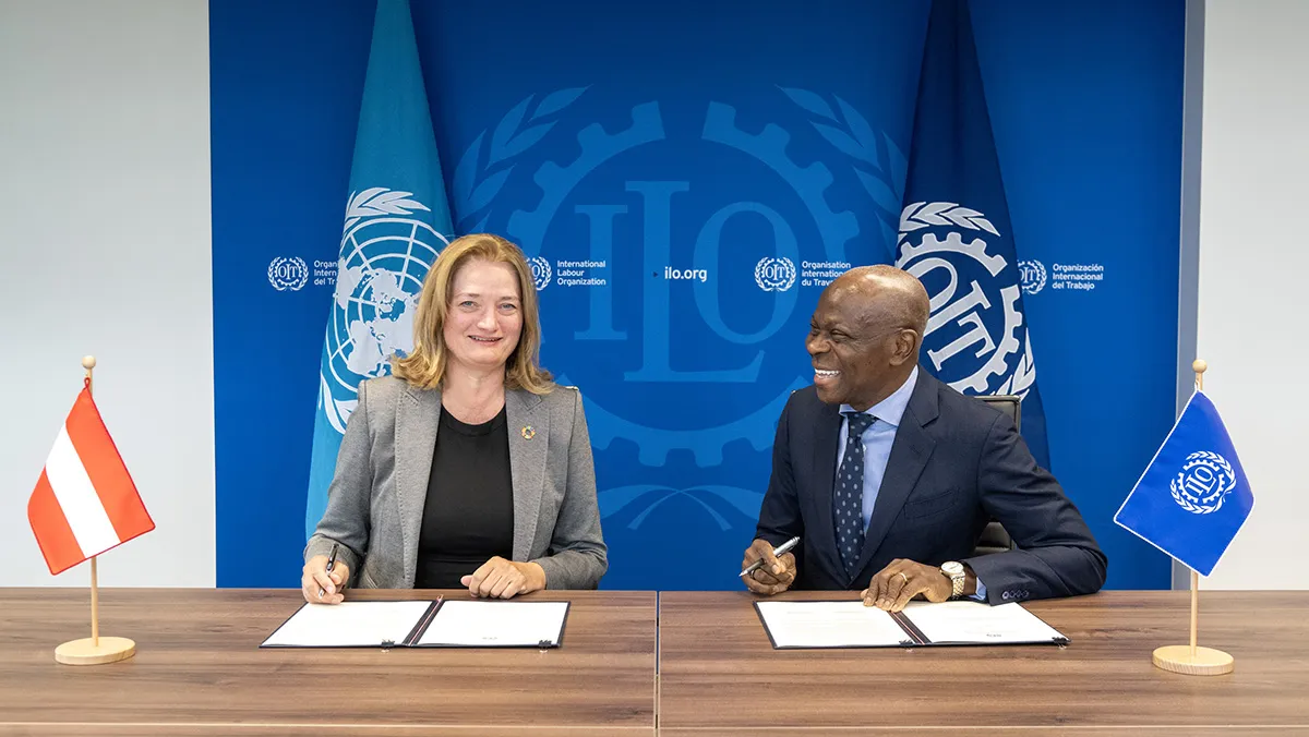 Ratification ceremony of Convention No. 190 on 11 September 2024: Ambassador Désirée Schweitzer, Permanent Representative of Austria to the United Nations in Geneva, and Gilbert F. Houngbo, Director-General of the ILO.