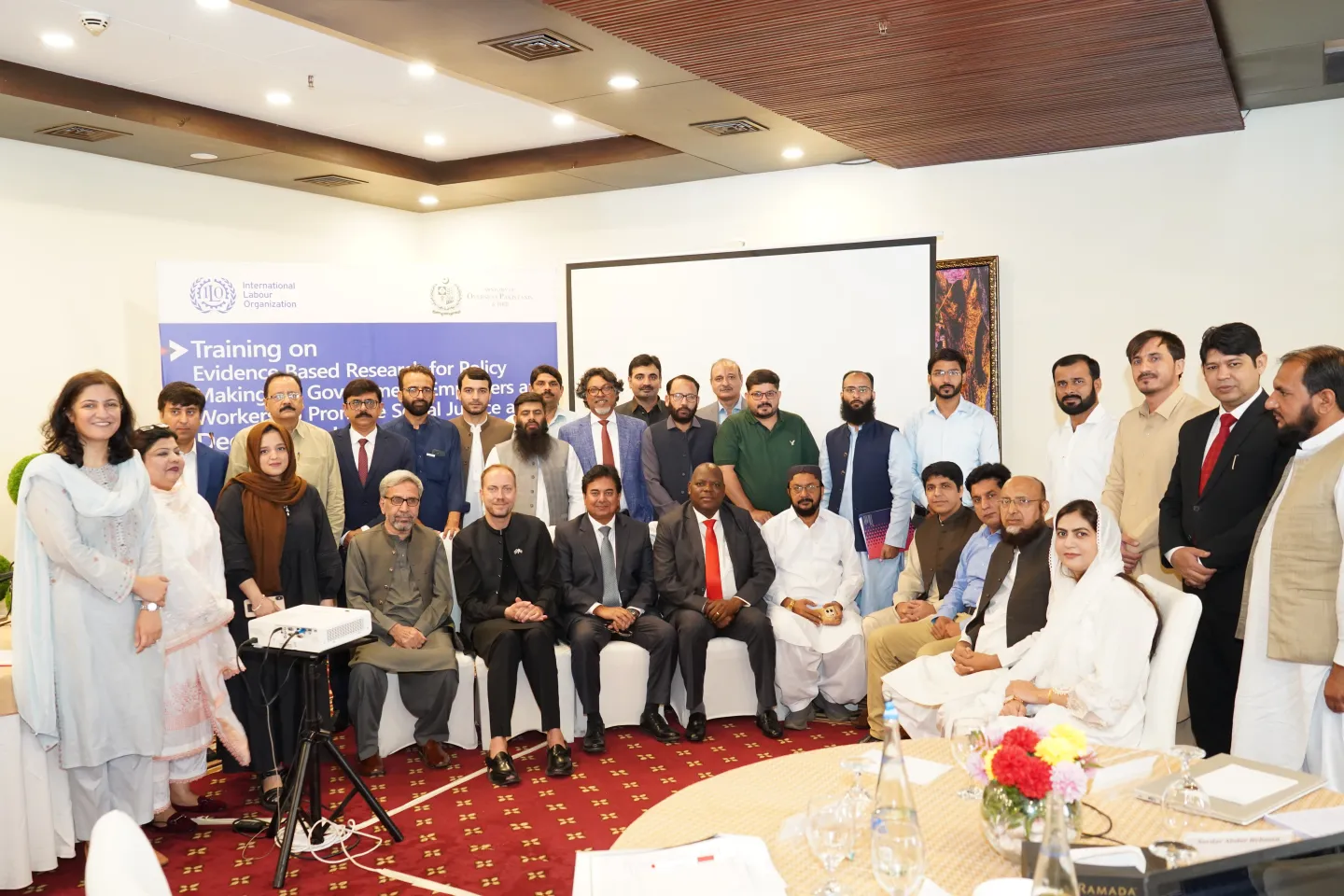 Participants pose for a group photo at the evidence-based policymaking training in Pakistan.