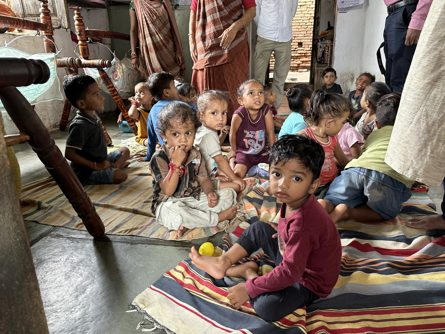 Children sitting together on the floor