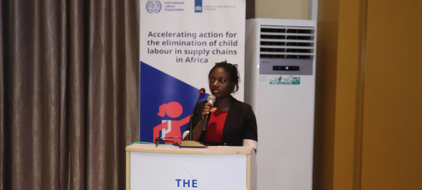 Lucia a project beneficiary gives a speech