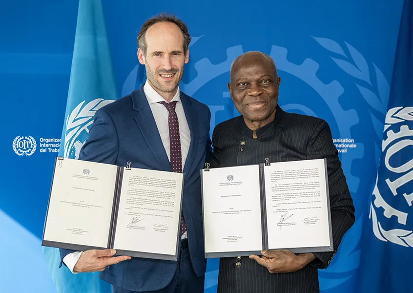 Ratification ceremony of Convention No. 187 on 4 October 2024: Mr Wilm Geurts, Director of International Affairs of the Ministry of Social Affairs and Employment of the Netherlands, and Gilbert F. Houngbo, Director-General of the ILO.