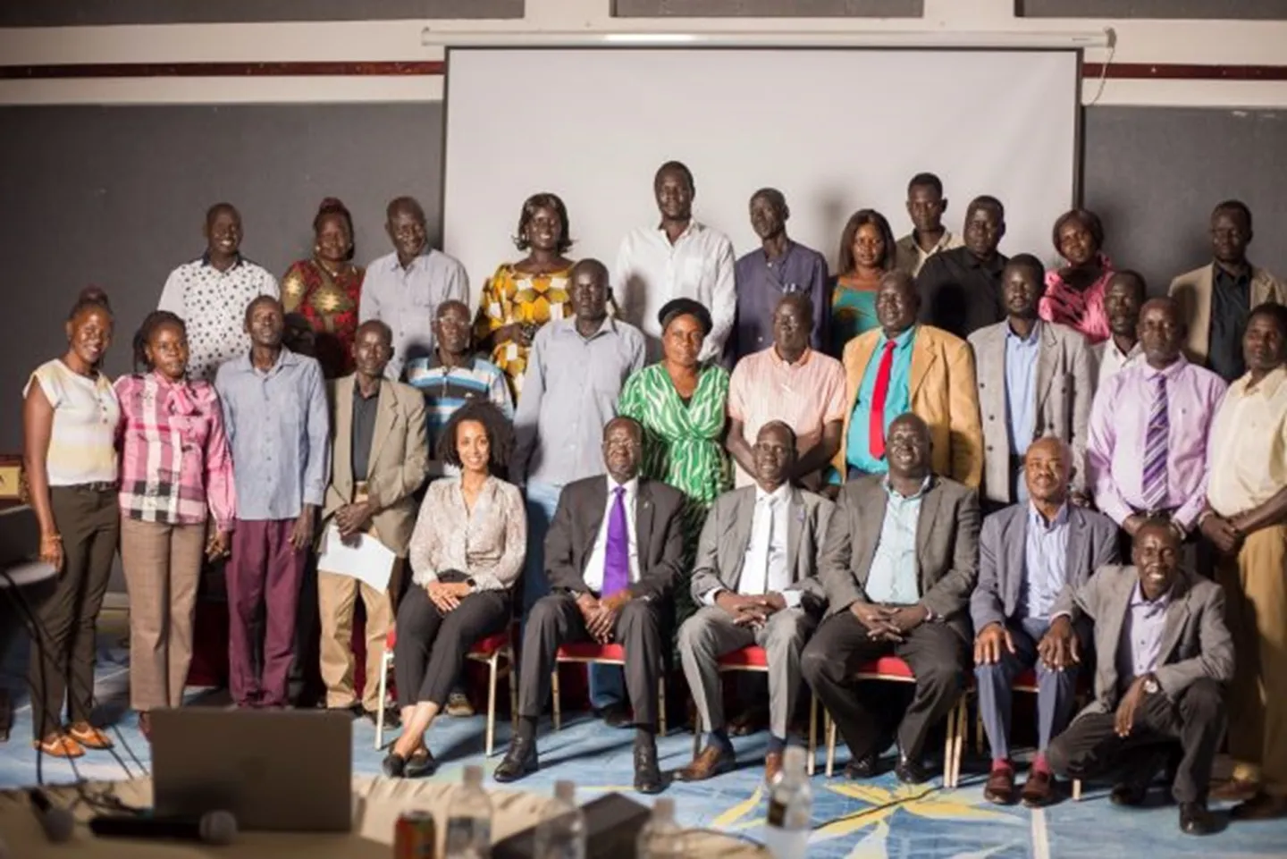 Group picture of people sitting and standing