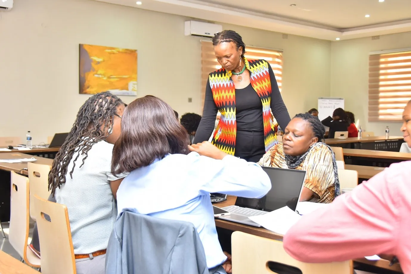 The ACTEMP Senior Specialist, Ms Maria Machailo-Molebatsi, emphasizing the importance of decent work among women entrepreneurs during group discussions (ILO)