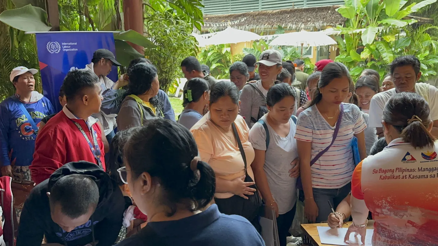 workers register at the social protection one-stop service