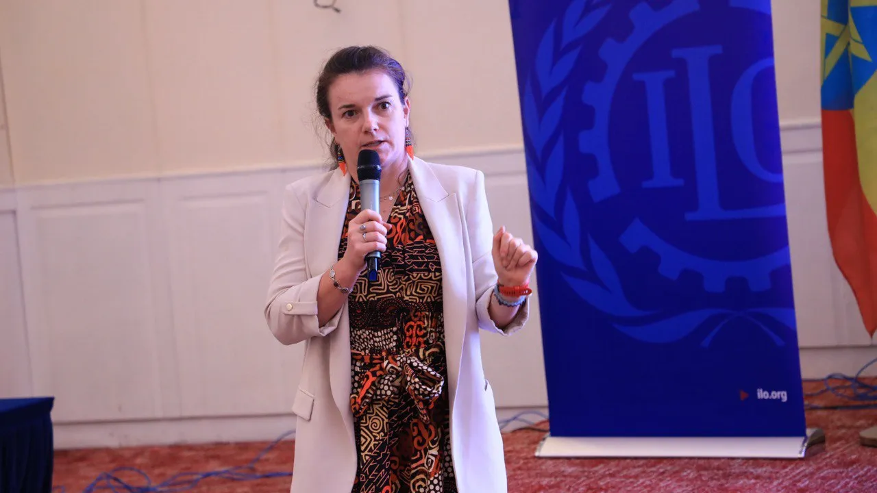 Women speaking infront of an audience