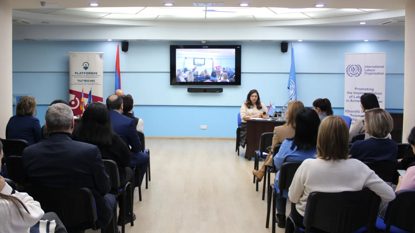 Group of people sit during the ILO-UNDP seminar initiated during 16 days against gender-based violence campaign