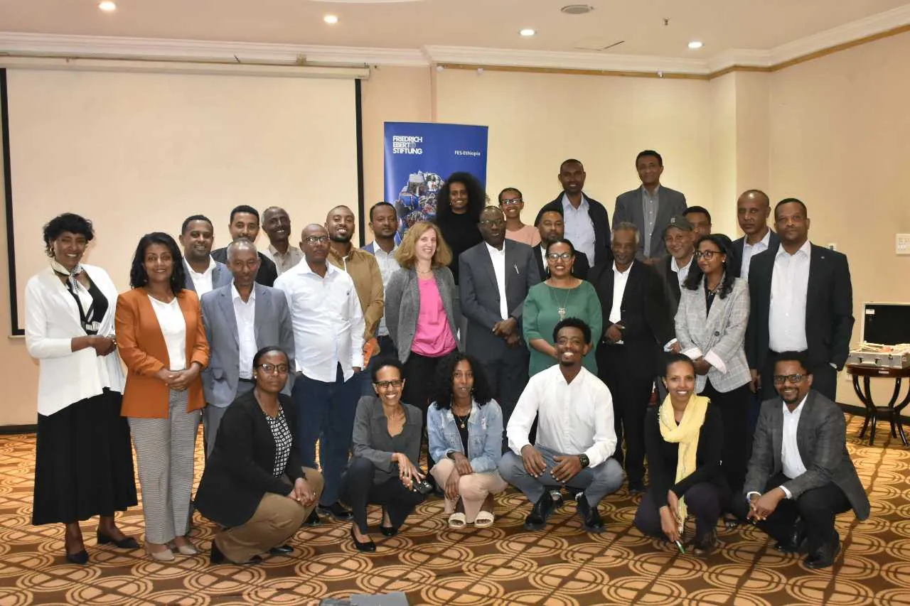 A group of Ethiopians standing and sitting for a photo