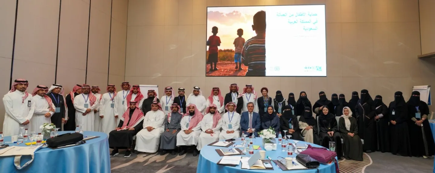 a group photo of ILO representatives with their partners and trainees