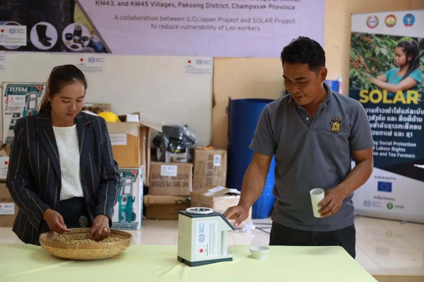 Tea and coffee farmers testing new equipment. 